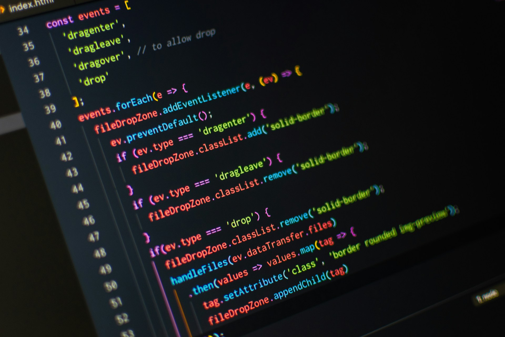 Javascript code displayed on a laptop screen